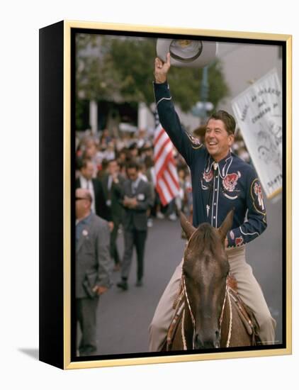 California Republican Gubernatorial Candidate Ronald Reagan in Cowboy Attire, Riding Horse Outside-Bill Ray-Framed Premier Image Canvas