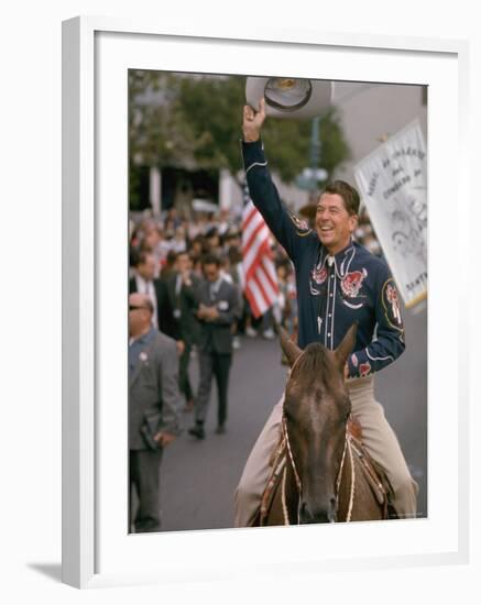 California Republican Gubernatorial Candidate Ronald Reagan in Cowboy Attire, Riding Horse Outside-Bill Ray-Framed Photographic Print