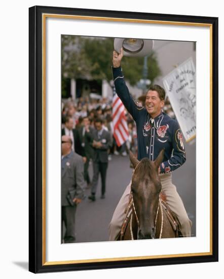 California Republican Gubernatorial Candidate Ronald Reagan in Cowboy Attire, Riding Horse Outside-Bill Ray-Framed Photographic Print