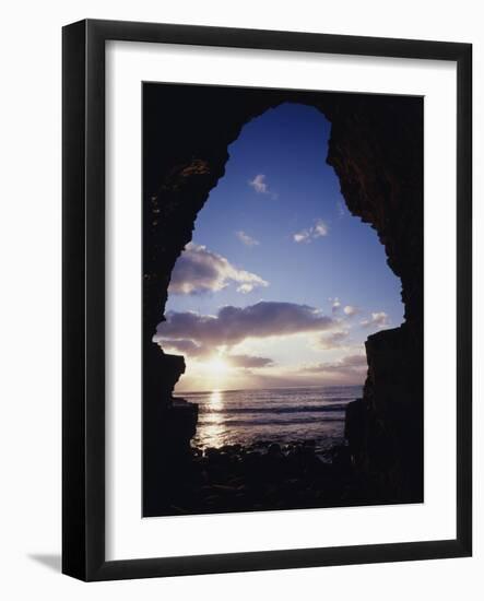 California, San Diego, Sunset Cliffs, Sunset Seen Through a Sea Cave-Christopher Talbot Frank-Framed Photographic Print