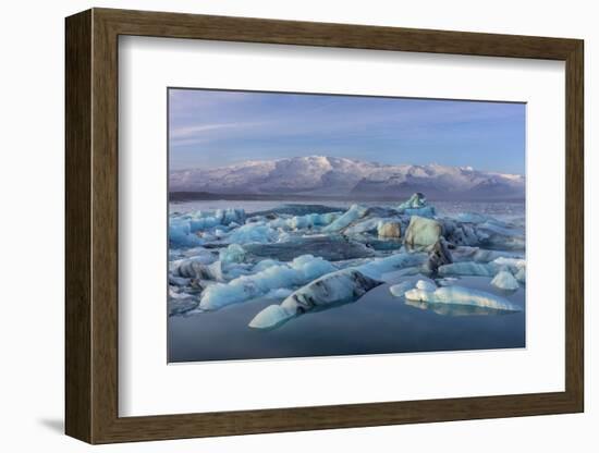 Calving icebergs in Jokulsarlon Glacier Lagoon in south Iceland-Chuck Haney-Framed Photographic Print