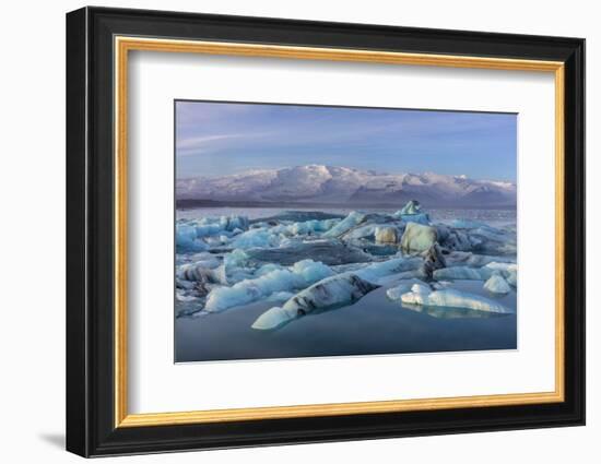 Calving icebergs in Jokulsarlon Glacier Lagoon in south Iceland-Chuck Haney-Framed Photographic Print