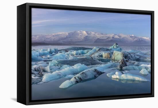 Calving icebergs in Jokulsarlon Glacier Lagoon in south Iceland-Chuck Haney-Framed Premier Image Canvas