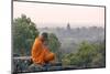 Cambodia, Siem Reap, Angkor Wat Complex. Monk Meditating with Angor Wat Temple in the Background-Matteo Colombo-Mounted Photographic Print