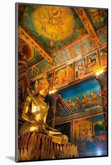 Cambodia. Wat Phnom is the cities highest point in Phnom Penh. Statues inside the temple.-Micah Wright-Mounted Photographic Print