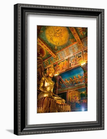 Cambodia. Wat Phnom is the cities highest point in Phnom Penh. Statues inside the temple.-Micah Wright-Framed Photographic Print