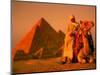 Camel and Driver Resting near the Great Pyramids, Egypt-Alexander Nesbitt-Mounted Photographic Print