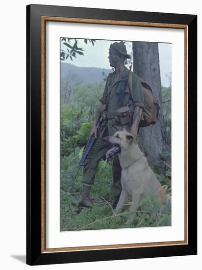 Camouflaged US Marine and His Scout Dog Named 'Major' in Vietnam, Nov. 1967-null-Framed Photo