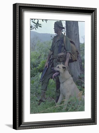 Camouflaged US Marine and His Scout Dog Named 'Major' in Vietnam, Nov. 1967-null-Framed Photo