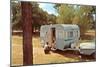 Camping Trailer in Woods-null-Mounted Art Print