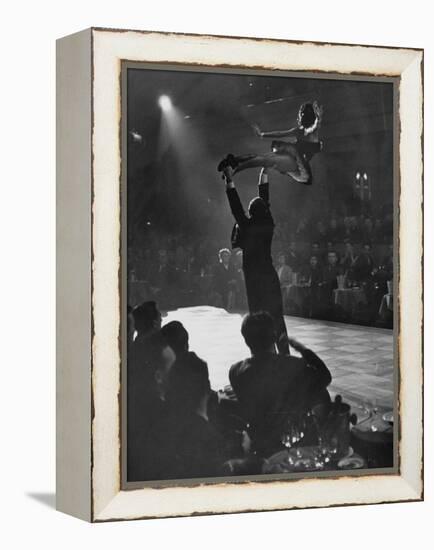 Can Can Dancer Held Up in the Air by a Performing Gentleman at the Paris Show-Nat Farbman-Framed Premier Image Canvas