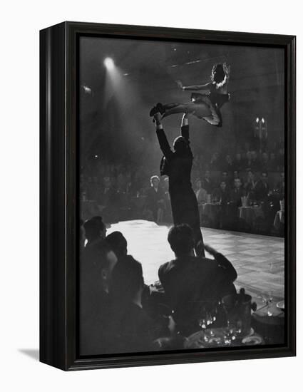 Can Can Dancer Held Up in the Air by a Performing Gentleman at the Paris Show-Nat Farbman-Framed Premier Image Canvas
