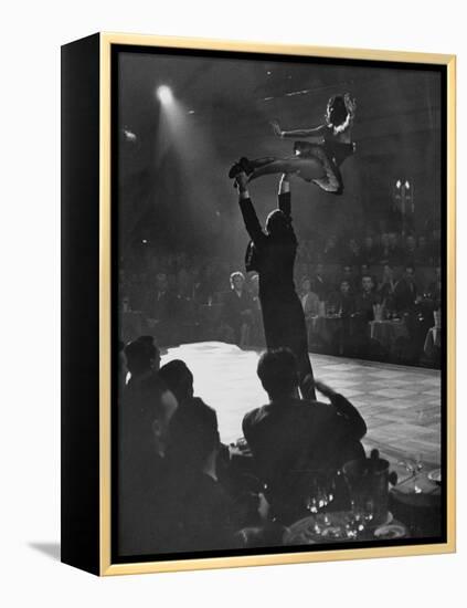 Can Can Dancer Held Up in the Air by a Performing Gentleman at the Paris Show-Nat Farbman-Framed Premier Image Canvas