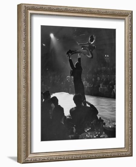 Can Can Dancer Held Up in the Air by a Performing Gentleman at the Paris Show-Nat Farbman-Framed Photographic Print