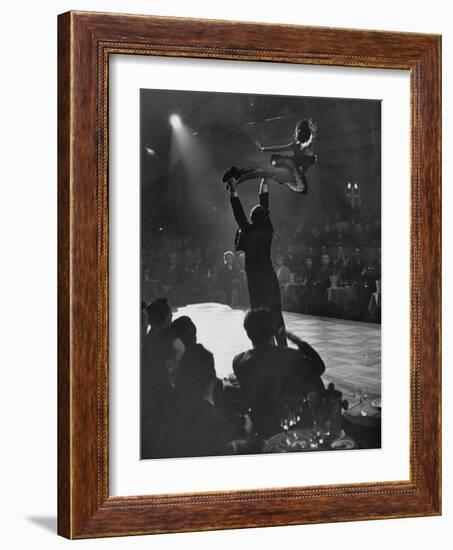 Can Can Dancer Held Up in the Air by a Performing Gentleman at the Paris Show-Nat Farbman-Framed Photographic Print