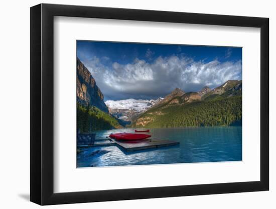 Canada, Alberta, Banff National Park. Canoes on Lake Louise dock at sunrise.-Jaynes Gallery-Framed Photographic Print