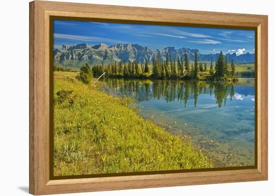 Canada, Alberta, Jasper National Park. Mountains and trees reflection in Talbot Lake.-Jaynes Gallery-Framed Premier Image Canvas