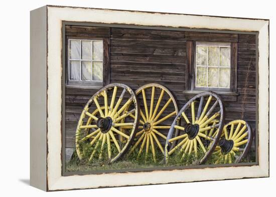 Canada, British Columbia, Barkerville. Wagon wheels.-Jaynes Gallery-Framed Premier Image Canvas