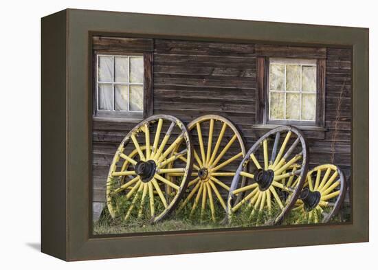 Canada, British Columbia, Barkerville. Wagon wheels.-Jaynes Gallery-Framed Premier Image Canvas