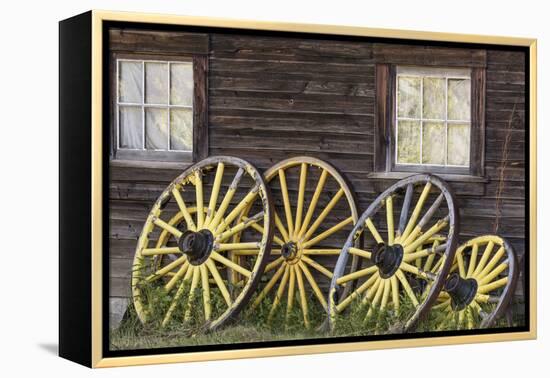 Canada, British Columbia, Barkerville. Wagon wheels.-Jaynes Gallery-Framed Premier Image Canvas