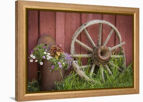 Canada, British Columbia, Cache Creek. Vintage wagon wheel.-Jaynes Gallery-Framed Premier Image Canvas