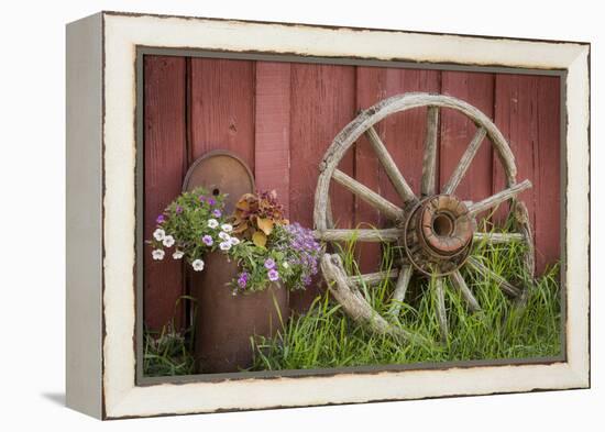 Canada, British Columbia, Cache Creek. Vintage wagon wheel.-Jaynes Gallery-Framed Premier Image Canvas