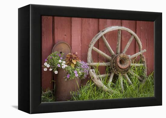 Canada, British Columbia, Cache Creek. Vintage wagon wheel.-Jaynes Gallery-Framed Premier Image Canvas