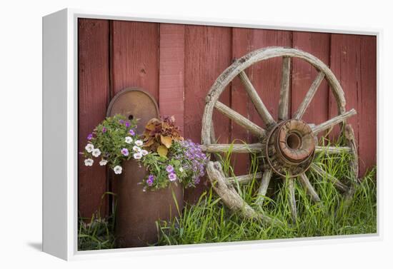 Canada, British Columbia, Cache Creek. Vintage wagon wheel.-Jaynes Gallery-Framed Premier Image Canvas