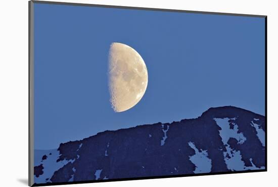 Canada, British Columbia. Half moon rising above mountain.-Jaynes Gallery-Mounted Photographic Print