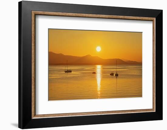 Canada, British Columbia, Vancouver Island. Sailboats at sunset on Vesuvius Bay.-Jaynes Gallery-Framed Photographic Print