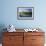 Canada Geese Resting at a Lake with Skyline, Calgary, Alberta, Canada-Peter Adams-Framed Photographic Print displayed on a wall