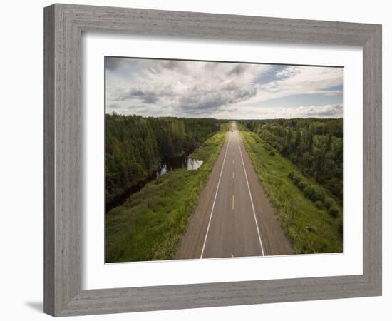 Canada, Manitoba, Thompson, Aerial View of Highway Through Boreal Forest-Paul Souders-Framed Photographic Print