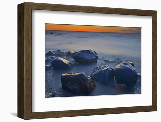 Canada, Manitoba, Winnipeg. Waves on shoreline rocks of Lake Winnipeg at dusk.-Jaynes Gallery-Framed Photographic Print