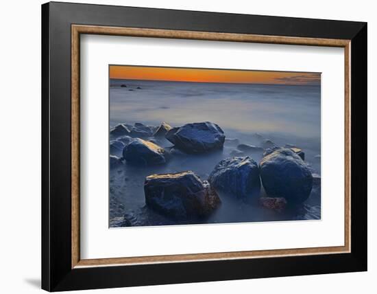 Canada, Manitoba, Winnipeg. Waves on shoreline rocks of Lake Winnipeg at dusk.-Jaynes Gallery-Framed Photographic Print