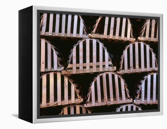 Canada, Newfoundland, Trout River, Tidy Stack of Wooden Lobster Traps-John Barger-Framed Premier Image Canvas