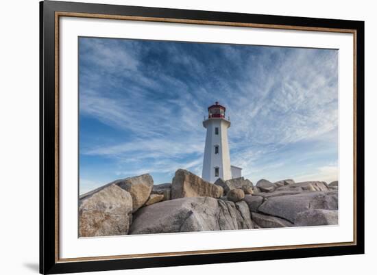 Canada, Nova Scotia, Peggy's Cove. Fishing village and Peggys Point Lighthouse.-Walter Bibikow-Framed Photographic Print