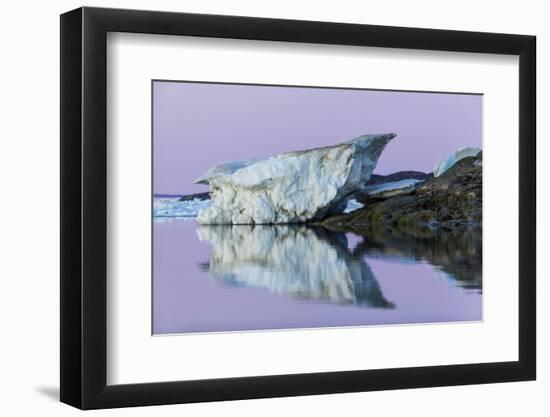 Canada, Nunavut, Iceberg Reflected in Calm Waters at Dusk-Paul Souders-Framed Photographic Print