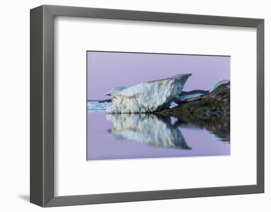 Canada, Nunavut, Iceberg Reflected in Calm Waters at Dusk-Paul Souders-Framed Photographic Print