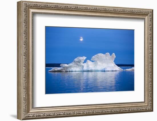 Canada, Nunavut, Moon Rises Behind Melting Iceberg in Frozen Channel-Paul Souders-Framed Photographic Print