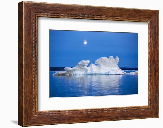 Canada, Nunavut, Moon Rises Behind Melting Iceberg in Frozen Channel-Paul Souders-Framed Photographic Print