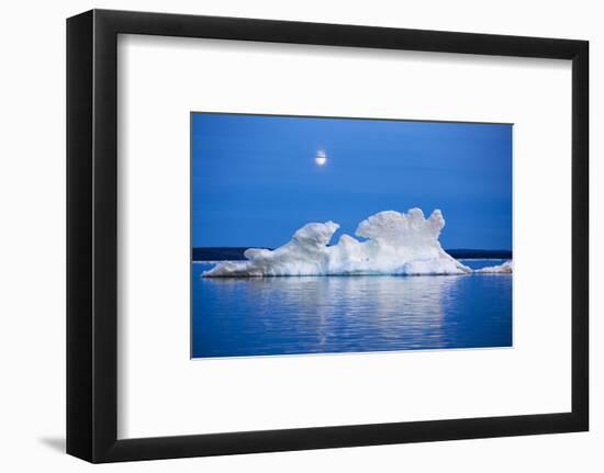 Canada, Nunavut, Moon Rises Behind Melting Iceberg in Frozen Channel-Paul Souders-Framed Photographic Print