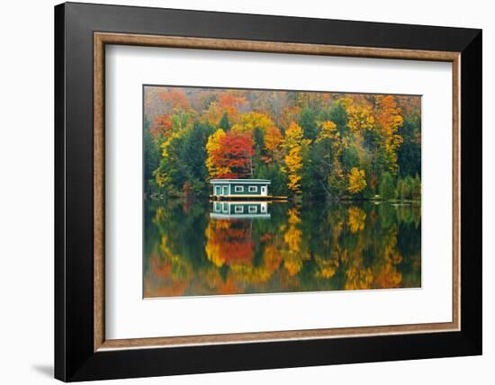 Canada, Ontario, Rosseau. Boathouse and reflection in autumn.-Jaynes Gallery-Framed Photographic Print