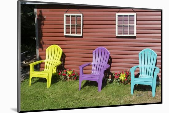 Canada, Peggy's Cove, Nova Scotia, Barn with Colorful Adirondack Chairs with Flowers-Bill Bachmann-Mounted Photographic Print