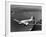 Canadian Colonial Airways Passenger Plane Flys over George Washington Bridge in Montreal, Canada-Margaret Bourke-White-Framed Premium Photographic Print