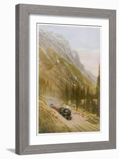 Canadian Pacific Railway Train Emerges from the Connaught Tunnel in the Selkirk Mountains-null-Framed Art Print