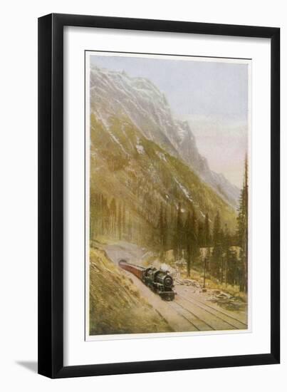 Canadian Pacific Railway Train Emerges from the Connaught Tunnel in the Selkirk Mountains-null-Framed Art Print