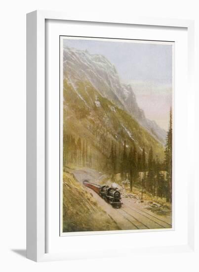 Canadian Pacific Railway Train Emerges from the Connaught Tunnel in the Selkirk Mountains-null-Framed Art Print