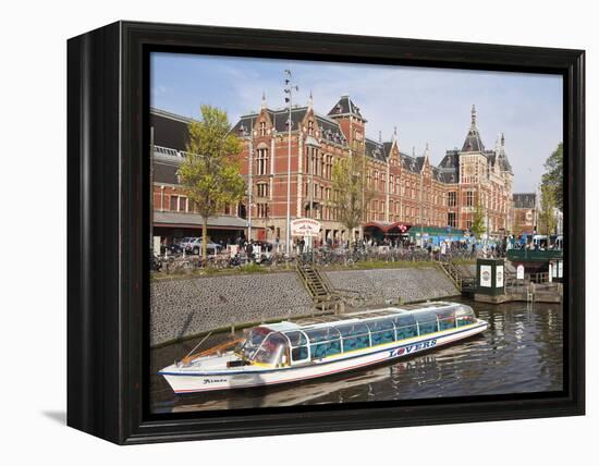 Canal Tour Boat Outside Centraal Station, the Central Train Station, Amsterdam, Netherlands, Europe-Amanda Hall-Framed Premier Image Canvas