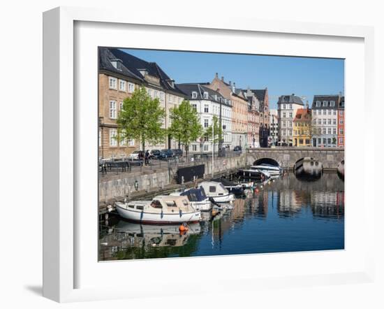 Canal under the Strombroen (Storm Bridge) with colourful houses in the old town, Copenhagen-Jean Brooks-Framed Photographic Print