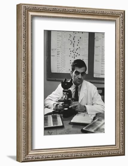 Cancer Specialist Dr. Ernest L. Wynder at Microscope in His Office, 1957-Alfred Eisenstaedt-Framed Photographic Print